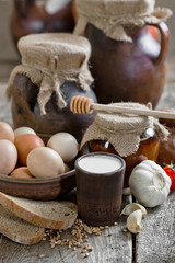Composition of milk on the bread, the old background
