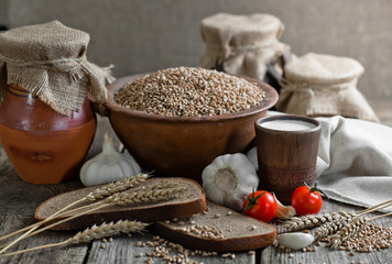 Composition of milk on the bread, the old background