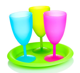 Bright plastic tableware isolated on white