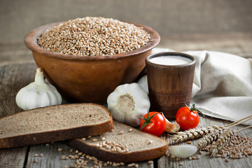 Composition of milk on the bread, the old background