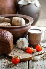 Composition of milk on the bread, the old background