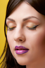 Naklejka premium woman on a yellow background