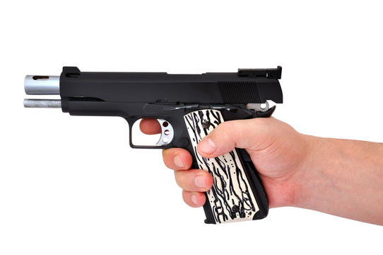 handgun in hand