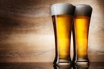 Foto op Canvas Two glass beer on wood background with copyspace © Igor Klimov