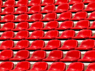 Naklejka premium regular red seats in a stadium