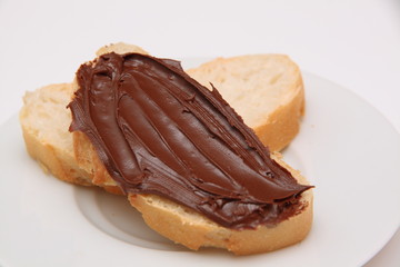 REBANADA DE PAN CON CREMA DE CACAO