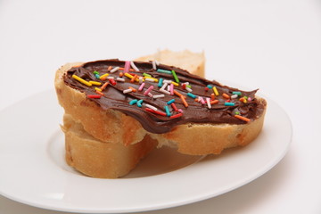 REBANADA DE PAN CON CREMA DE CACAO