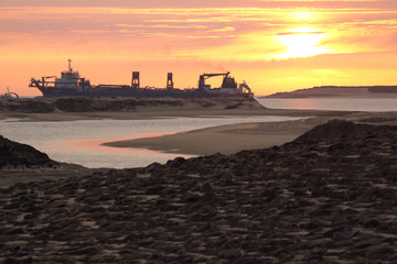 A dredging vessel along the Dutch shore
