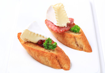 Crostini with cheese and salami