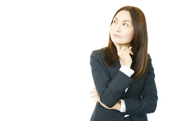 困惑した表情のオフィスレディー