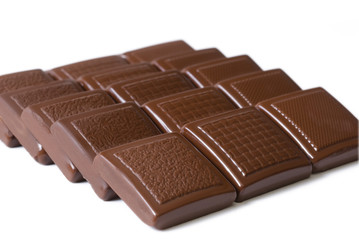 Segments of chocolate insulated on white background
