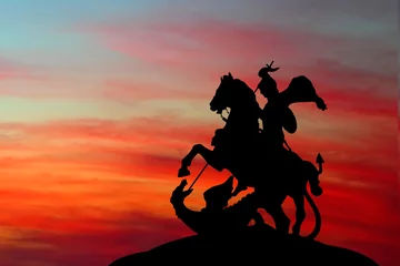 Fototapete Drachen Saint George und der Drache auf Sonnenuntergang Hintergrund