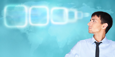 Man working with virtual interface on blue digital background