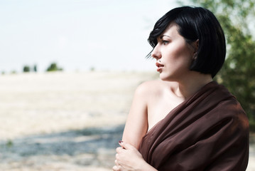 girl posing in a tree shade