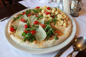 Pizza with Pasta food combination, Restaurant table close-up photo