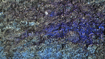 Color gasoline fuel spot on black asphalt