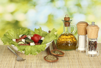 tasty greek salad on bright green background
