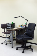 Working place of manicure master in the beauty salon