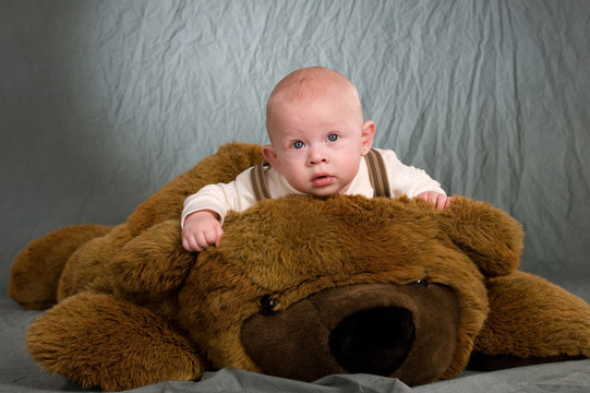 baby on teddy