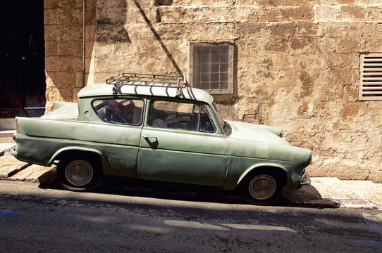 Old car in a street of Valletta, Malta