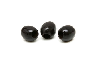 Three black olives shot on white background