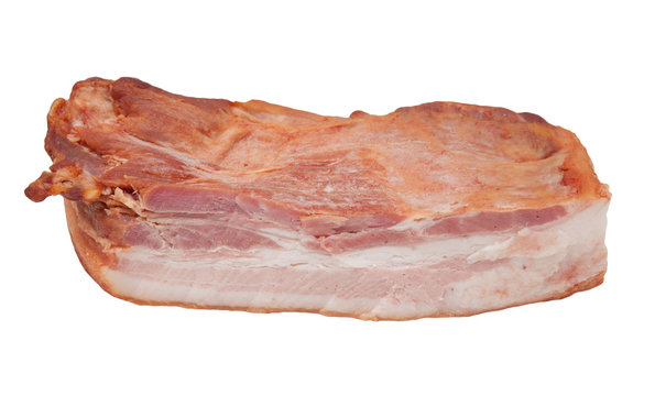 Smoked bacon chunk isolated over white background.