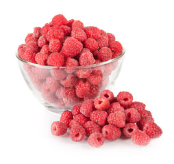 fresh raspberries in a bowl isolated on white