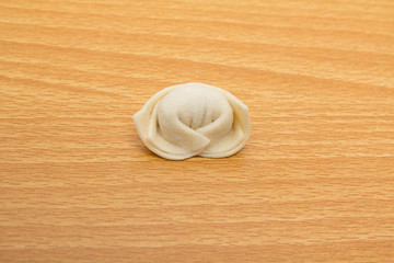 homemade meat dumplings on a cutting board