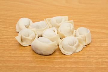 Fototapeta na wymiar homemade meat dumplings on a cutting board