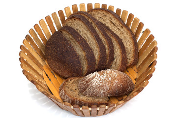 Black bread on board on white background