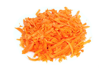 Pile of shredded carrots isolated on a white background