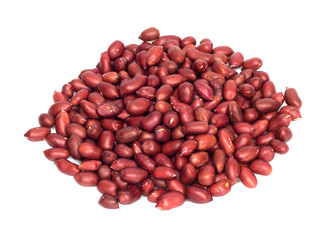 Peanuts with red skin isolated on white.