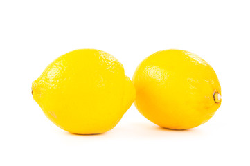 two ripe lemons isolated