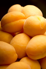 Fototapeta na wymiar Heap of ripe apricots