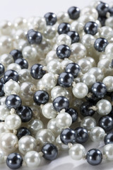 String of black and white pearls