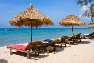 Sun loungers with an umbrella