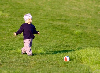 Child playing football