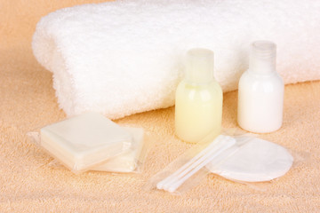 Hotel amenities kit on towel