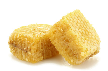 golden honeycombs isolated on white.