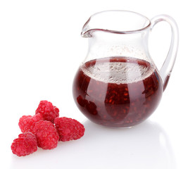 Raspberries and jug with jam isolated on white