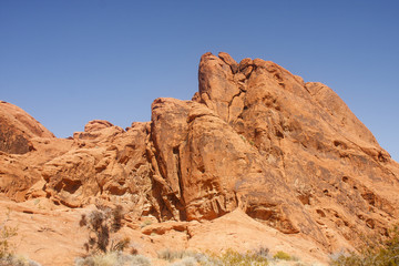 Fototapeta premium Red Rocks Rising into Blue Sky