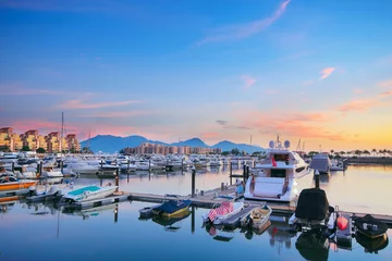 Papier Peint photo autocollant Ville sur leau yachts in the golden coast sunset ,in hongkong