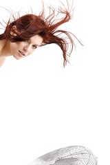 beautiful young woman with an electric fan (white background)