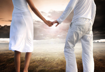 Enjoying pure freedom | Happy couple holding hands