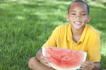 Happy African American Boy Child Eating Water Melon