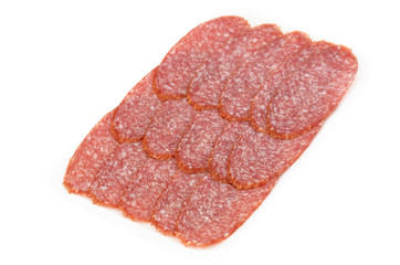 Slices of salami in a plastic container