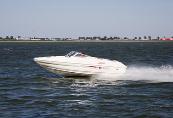 Fototapeta premium fast speedboat on the lake, the netherlands