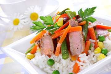 Rice with pork meat and vegetables