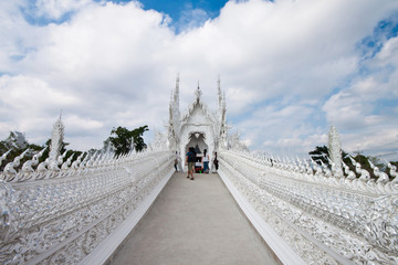Fototapeta premium White church in Wat Rong Kuhn reflection, northern Thailand