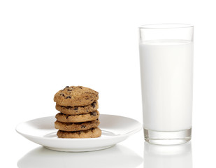 Glass of milk and cookies isolated on white